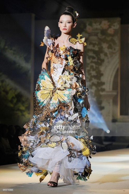 Yumi Katsura, 2010. This dress is decorated with 1000 butterflies made from 50,000 fish scales.