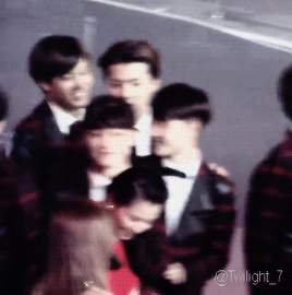 kyungsol: jongin grabbing kyungsoo by the waist what resulted in kyungsoo punching