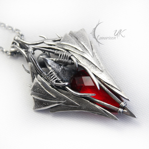 biozonic:  NAHSDURX - silver and red quartz by LUNARIEEN