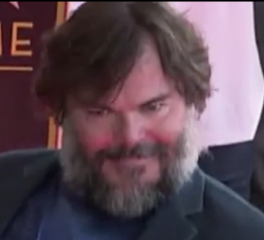 scarecrow-hero: scarecrow-hero:  So Jack Black got a star on the Hollywood Walk of Fame and was posing for pictures and   The face of a man who knew exactly what he was doing when they panned over his outfit. 