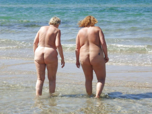 XXX Two nude old ladies enjoying the beach trolling photo