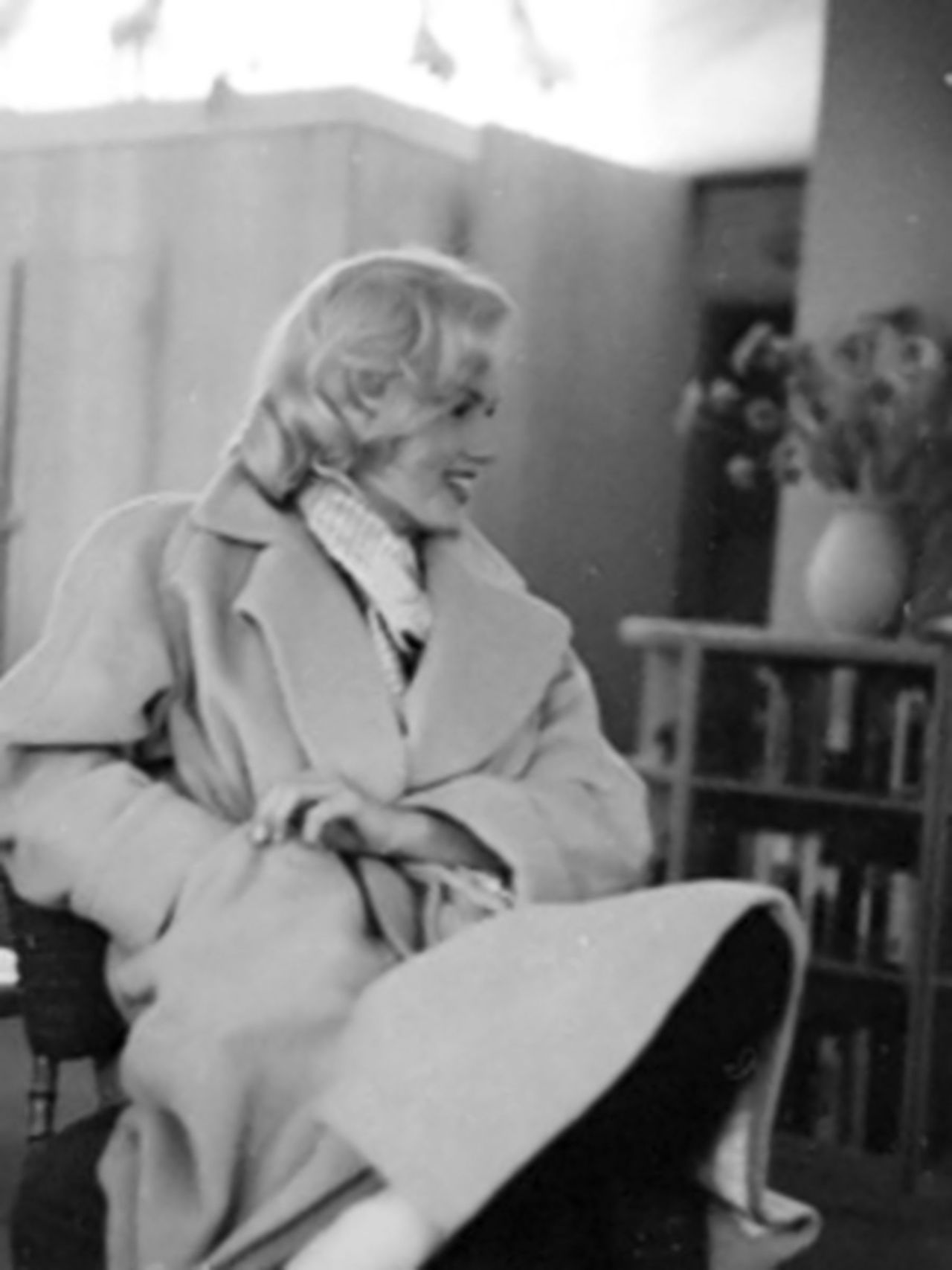 miss-vanilla:Marilyn Monroe - Camel Coat Sitting, 1953. Photographed by Milton Greene.