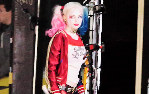 movienetworkpr:  Hey Puddin’s! Check out Margot Robbie on set in Toronto for Suicide Squad!Tidbits: Her shirt says “Daddy’s Lil Monster”, the back of her jacket says “Property of Joker” and one of Harley’s weapons, her bat, says “Good