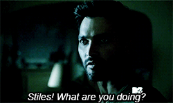 bilesandthesourwolf-deactivated:  Derek knows Stiles is in trouble and comes in, guns blazing, ready to help, only to realize Stiles has the situation in hand. And then Derek starts to notices that something isn’t quit right with the teen. 