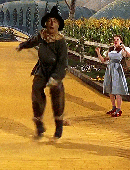 JONATHAN BAILEY AS FIYERO TIGELAAR IN WICKED RAY BOLGER AS THE SCARECROW IN THE WIZARD OF OZ