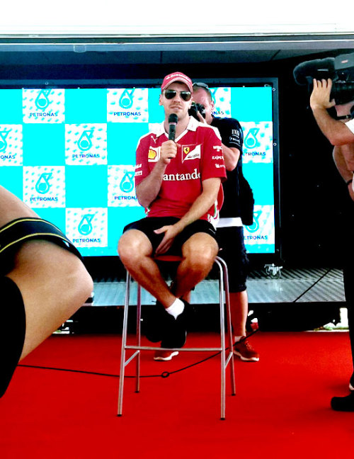 Sebastian Vettel at the Malaysian GP Fan Forum (also check out Hulk looking almost directly into my 