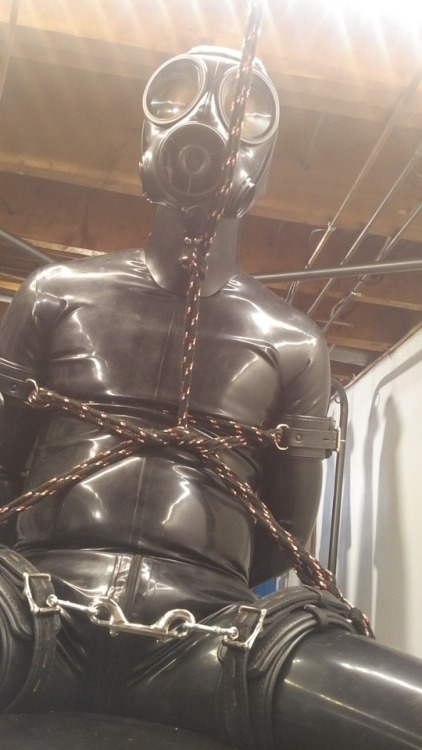 slaverubbergimp: rubbertopboys:Just Another Sunday Afternoon! Having fun with a rubber Gimp!!  oink 