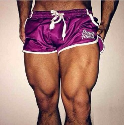 shorts-and-underwear:  Amazing purple silky shorts that looks for a girl but no doubt on this strong thigs Hunk! 