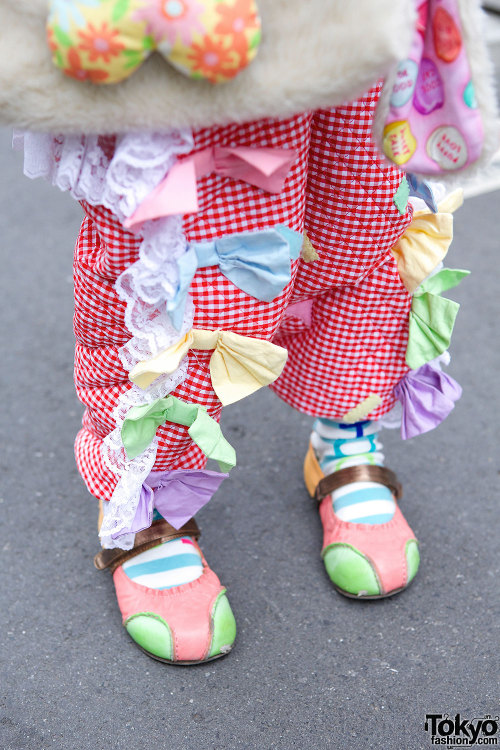 Adorable next generation Harajuku girl Moka wearing a colorful Jam coat and cute items mostly handma