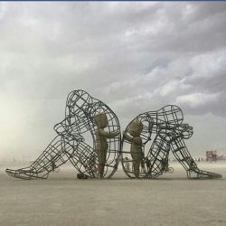 allimaginedandallconceivable:  hisemeraldlily:  LOVE is a 2015 Burning Man sculpture by artist Alexandr Milov from Odessa, Ukraine. It demonstrates a conflict between a man and a woman as well as the outer and inner expression of human nature. The figures