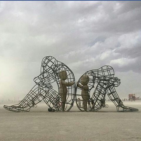 allimaginedandallconceivable:  hisemeraldlily:  LOVE is a 2015 Burning Man sculpture by artist Alexandr Milov from Odessa, Ukraine. It demonstrates a conflict between a man and a woman as well as the outer and inner expression of human nature. The figures