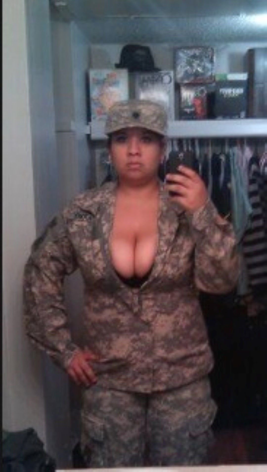 usmilitarysluts:  Army SPC Bustamante with big pierced tits lets them hang loose