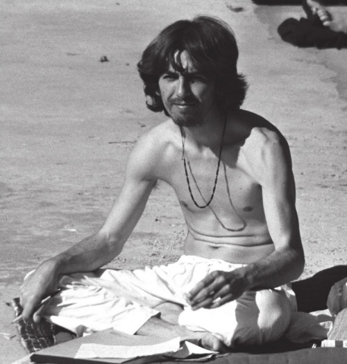George Harrison in Rishikesh, India, 1968; photo by Mal Evans.“Firstly, I think too many people here