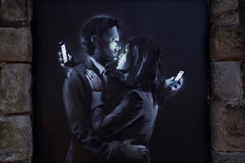   Banksy’s New Piece, “Mobile Lovers”