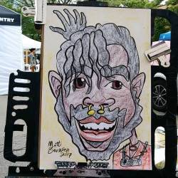 Doing caricatures at the Central Flea in