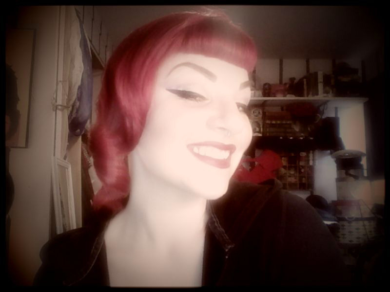 thesmokingstiletto:  Minor change to hair and makeup before heading out tonight…