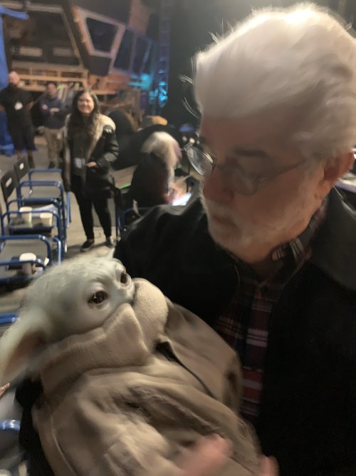 demifiendrsa:    Jon Favreau shares a photo of George Lucas holding The Child.