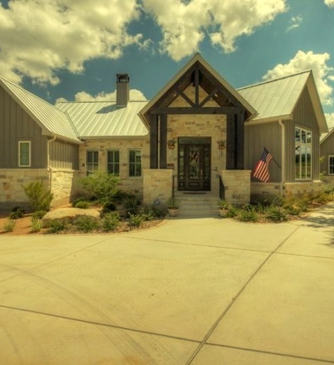 Metal Roofing In Austin Mid-sized Cottage Gray Two-story Wood Exterior Home Idea With A Metal Roof