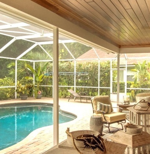 Large Traditional Backyard Brick Patio Design With An Addition To The RoofPatio - Large Traditional Backyard