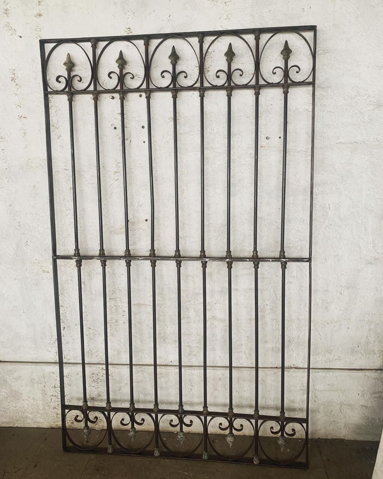 WROUGHT IRON PANELA fantastic late 19th century wrought iron panel with matching scrolled decoration on top and bottom. A great piece both for interior or exterior decor.Item No. 1645Dimension: 7ft tall x 51″ wideList Price: $ 950504.581.3733 / tinfo@labellenouvelle.com / e #antiques#architectural antiques#wrought iron#garden antiques#window guard#iron panel#garden decor#interior decor#nola#magazine street