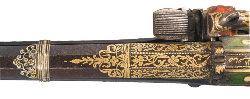 peashooter85:Unique North African Miquelet carbine with gold, bone, and ivory inlays.Sold At Auction