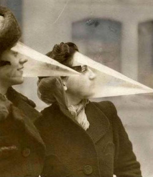 unexplained-events:  Conical face coverings to protect from precipitation.  