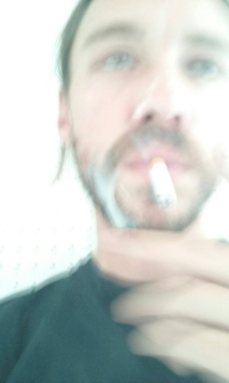 tattootodd80:  Enjoying a smoke with my face covered on cum