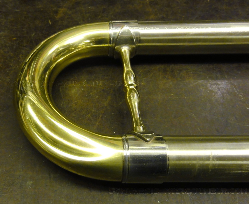 synthesis-music:  Dent in a tuba tuning slide (along with a crushed bell, broken