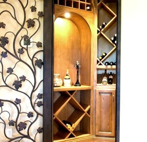 Phoenix Mediterranean Wine CellarPhoto Of A Sizable Wine Cellar With A Tuscan Travertine Floor And Diamond