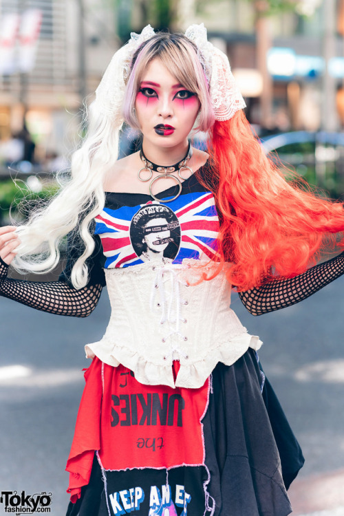 tokyo-fashion:  Kay - designer of the independent Japanese remake fashion brand Heiligtum - on the street in Harajuku wearing a remake punk top over a fishnet top, a Heiligtum remake skirt, ruffle corset, choker, and Vivienne Westwood rocking horse shoes.