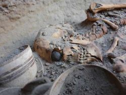sixpenceee:  The following is an ancient prosthetic eye, on a female skeleton who is about 4800 years old. The skeleton was 1.82 m tall (6 feet), much taller than ordinary women of the time. This young woman lived in what would now be Iran. Experts say