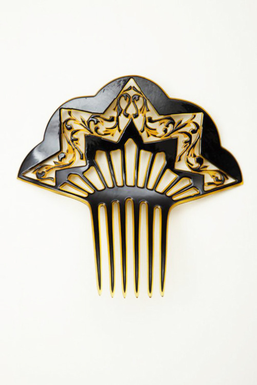 Combs, 1840-1909. Made of celluloid, one of tortoise shell. Via Goldstein Museum of Design.