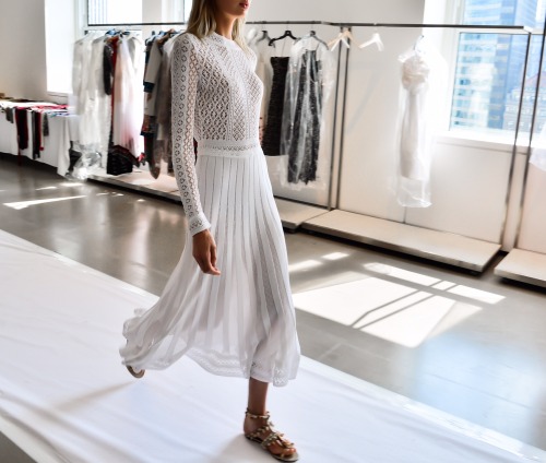 Dreamy lace-stitch separates catch the light inside the Oscar de la Renta showroom.