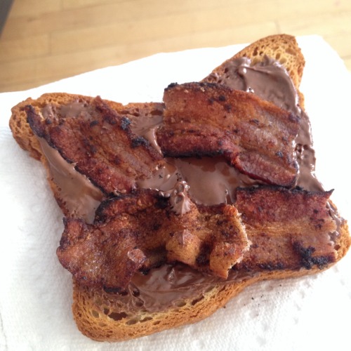 The tastiest breakfast thing I’ve had in my mouth in a very long time.   Bacon and Nutella on GF toast. Fucking amazing.