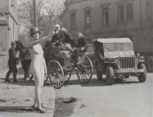 historylover1230: A shop mannequin wearing a German helmet giving a Nazi salute in Allied occupied B