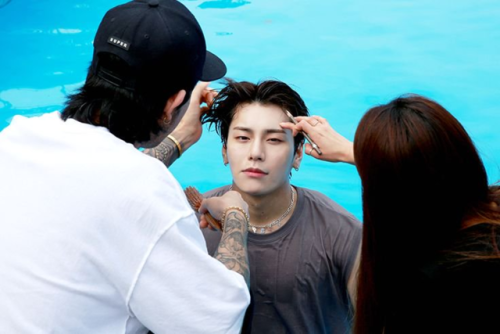 I am stan Twitter collectively loosing it over this one photo of wet Kim Sanggyun to the point the t
