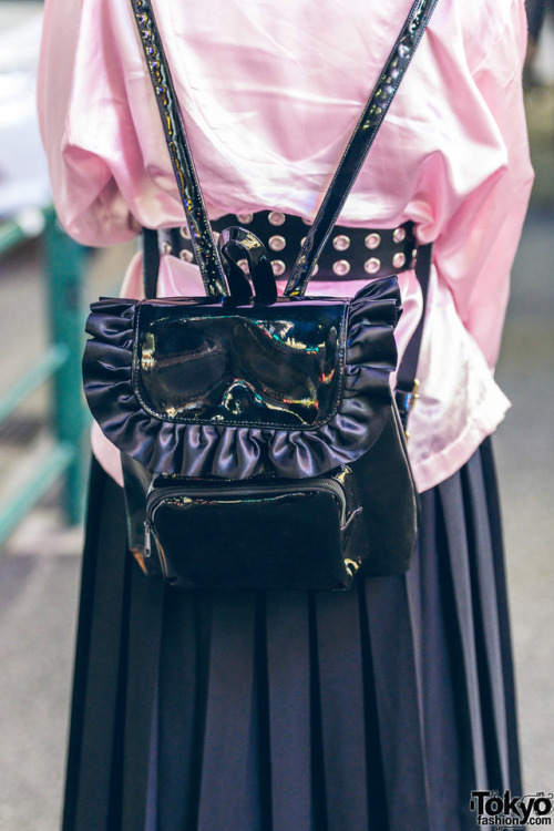 19-year-old Japanese fashion student Ranochan on the street in Harajuku with pink hair and piercings