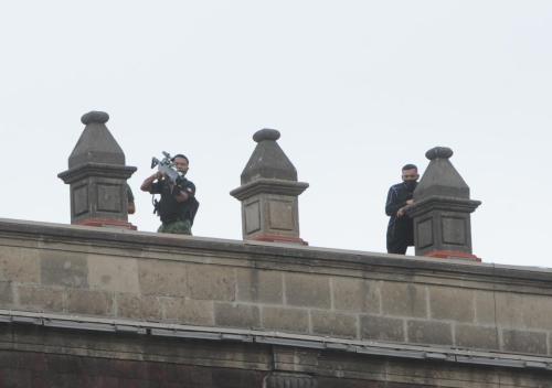 Snipers on the roof. Right now in Mexico City. They have gassed the (mostly) women demonstrating. Pl