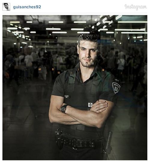 morningcupofaboveaveragejoe:  Meet Guilherme Leão. He’s 22 and works as a subway security guard in São Paulo, Brazil. He became a web celebrity after being voted the hottest guard. Fans have been stopping him for photos, making his daily rounds impossible