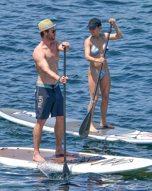 theavengersfans: Chris Hemsworth and Elsa Pataki doing stand-up surf during the weekend.