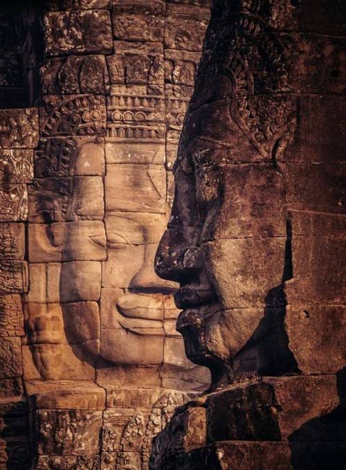 Massive carved Smiling Faces of the Bayon Temple of Angkor, Cambodia