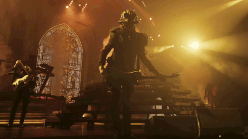 After the song is over, Phantom eggs on the crowd by waving his arms in the air, gesturing toward himself. In the background Ghoulettes Cumulus and Aurora wave their arms and Rain Ghoul changes his bass. Yellow lights blare.