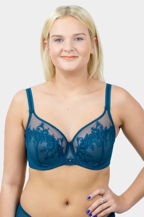 Vibrant blue bra and brief combination that our model has matched with iridescent nail lacquer. The 