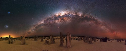 amazinglybeautifulphotography:  The Milky Way and Magellanic Clouds above the Pinnacles Desert about 2 hours north of Perth, Western Australia[OC] [6144x2513] - Author: shiningmoment1985 on reddit