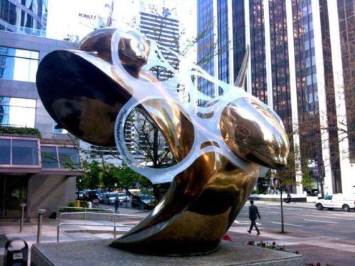 sparklezoi:sixpenceee:In 2010 a group tangled a giant plastic six-pack on a sculpture of dolphins in