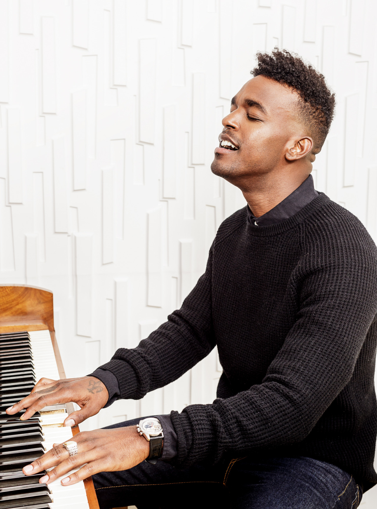 gap:  Singer-songwriter Luke James picks a Gap sweater for a comfortable piano session.