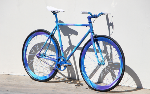 fixie003:  Custom Painted AeroFix Fixed Gear Glow Bike! Artist Neonski using Montana Paint