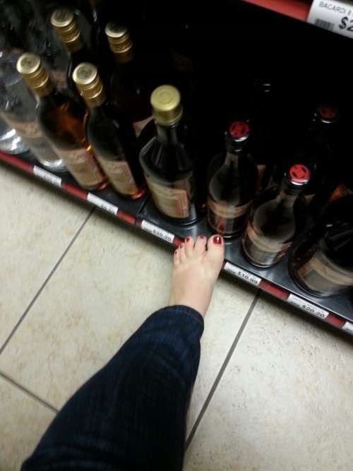 alejandra-53-feet: funtexascouple1976: At work. Liquor store toes!!! In the cooler and next to the r