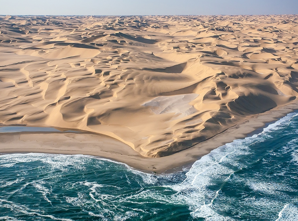 boss-hoody:  sixpenceee:  This is where the Namib desert meets the Atlantic ocean.