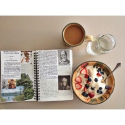 tiredsunday:  Breakfast from earlier this week: frozen banana, water, and natural peanut butter blended into ice cream and topped with strawberries and blueberries, coffee, and The Master and Margarita.